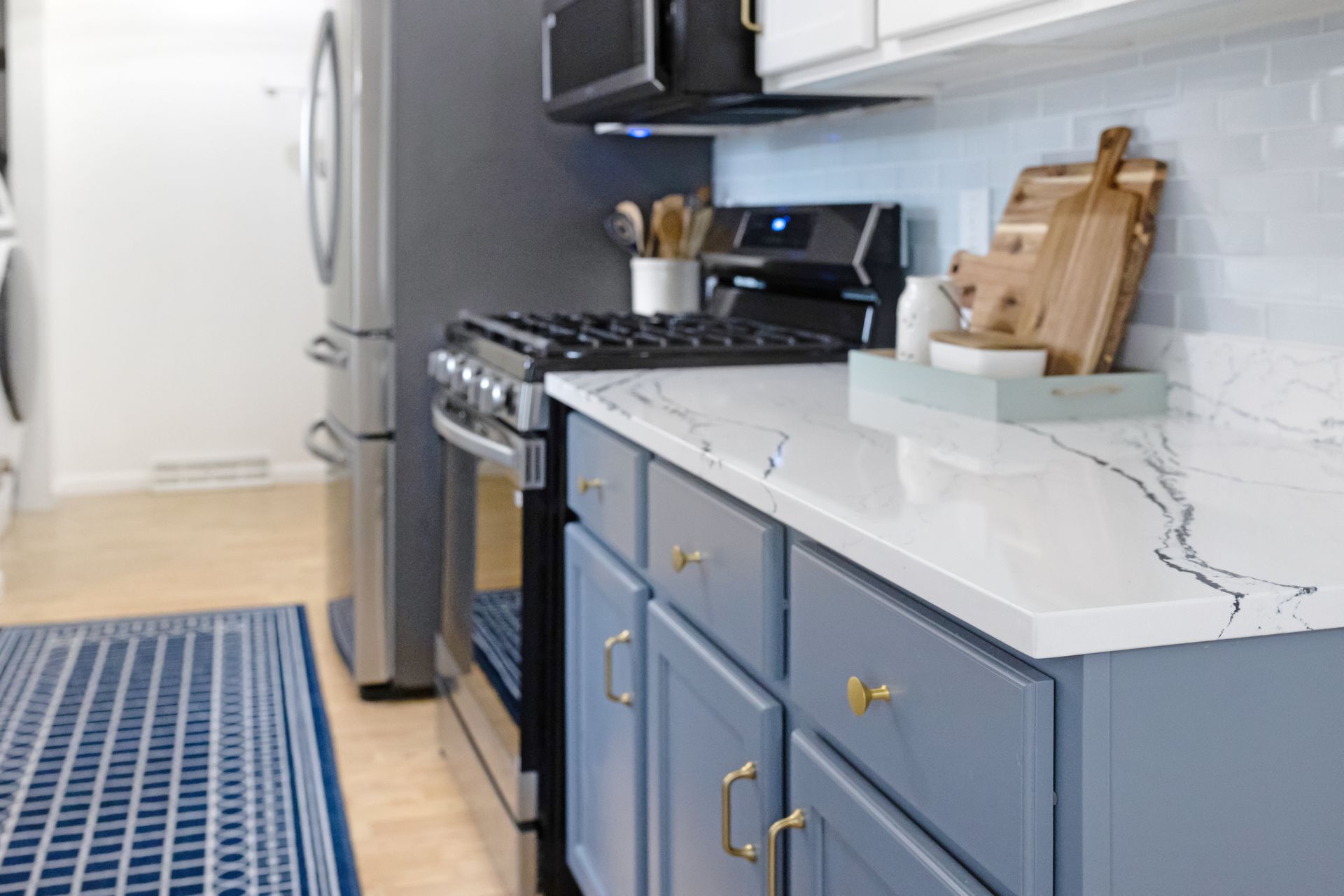 Custom Built Cabinets, Upper - Swiss Coffee, Lower - Storm Cloud, Cambria Potrush Countertops by Counter Culture