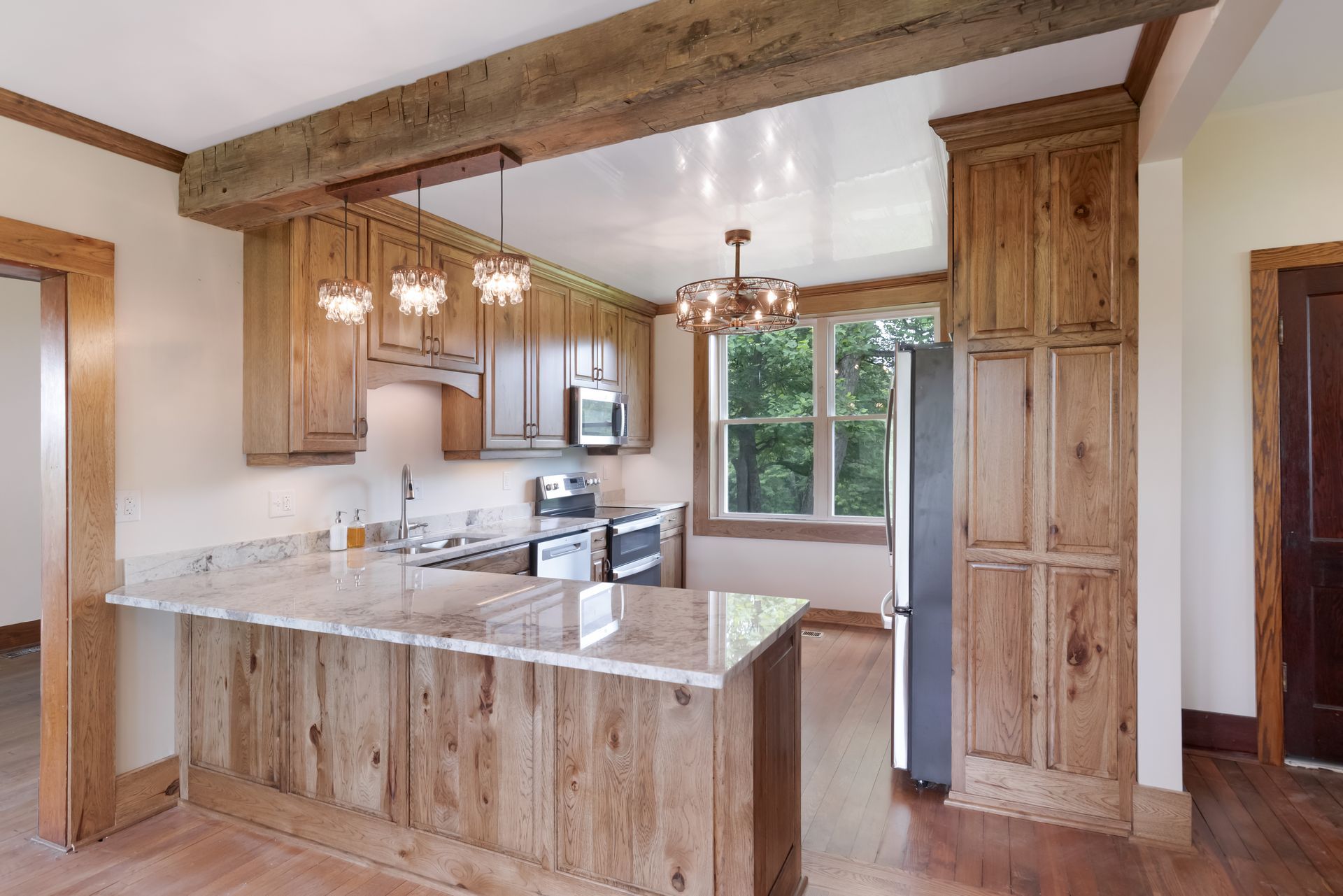 Custom Built Stained Hickory Cabinets, Mona Lisa Granite by Counter Culture