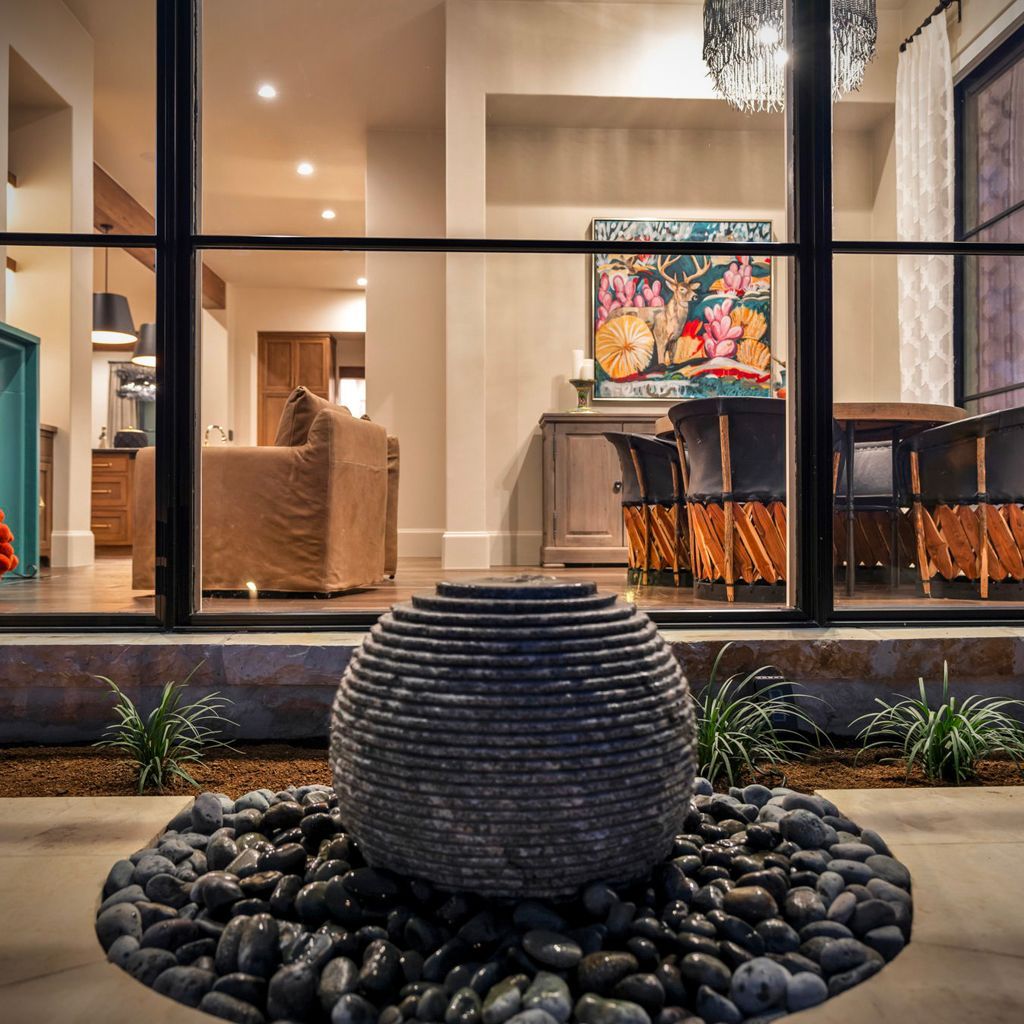 Outdoor water feature with stone detailing