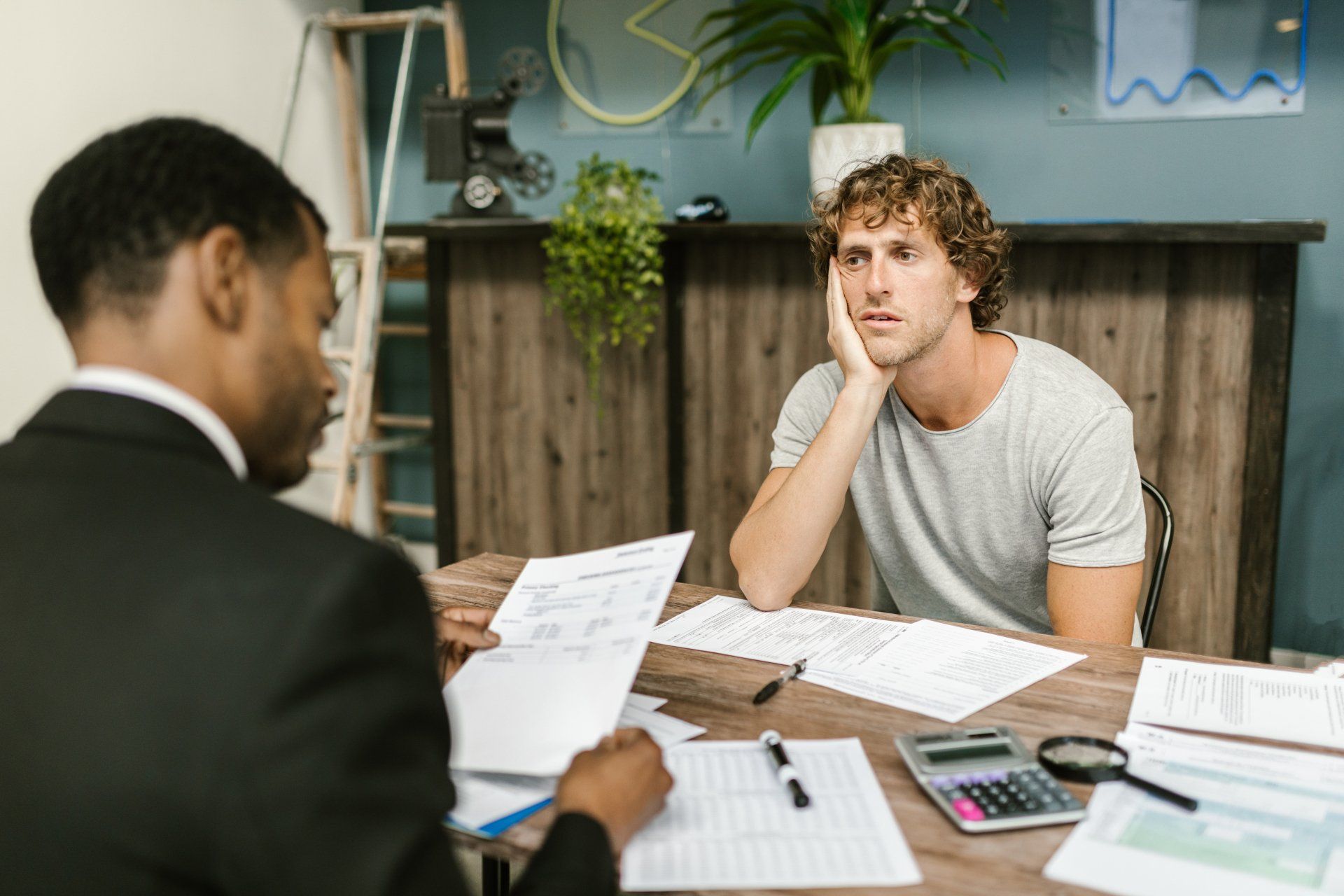 worried man with his lawyer