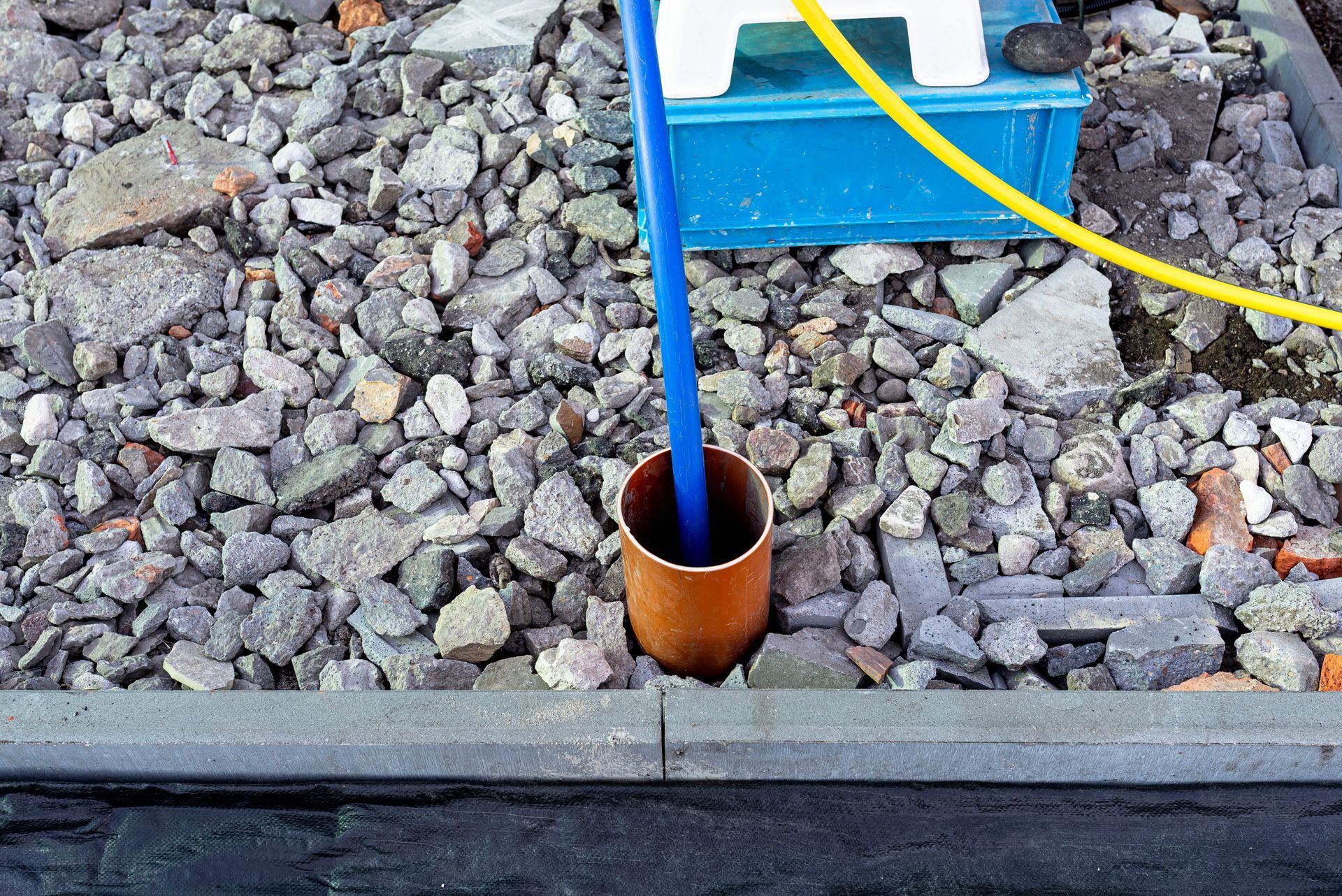 Groundwater well repair with pipe and gravel. Groundwater well repair with pipe and gravel.