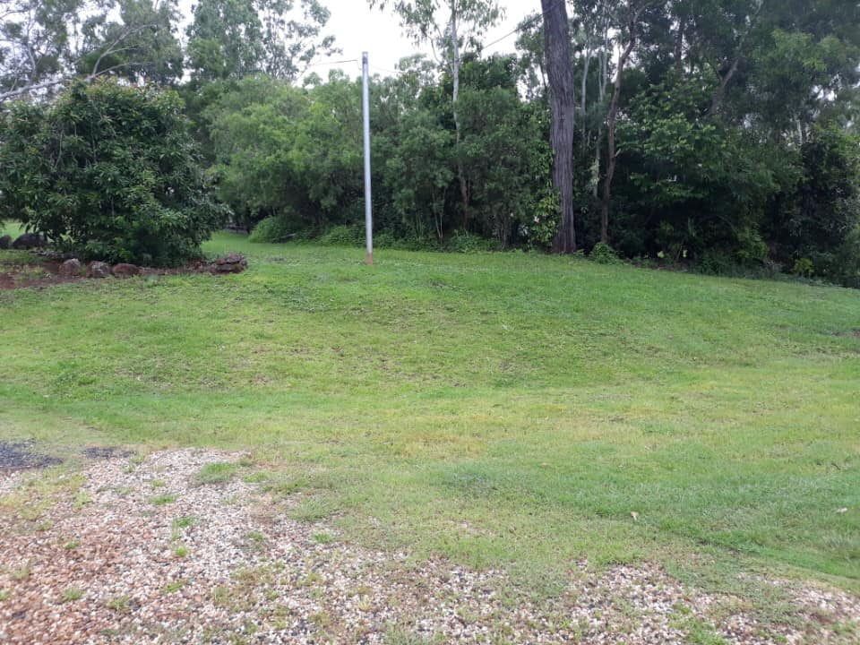 Green Grassy Lawn With a Gravel Area in the Foreground — Macca's Dynamic Earthworks in Tolga, QLD