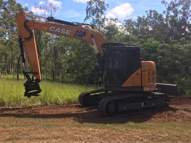 Orange Case Excavator on a Dirt Surface — Macca's Dynamic Earthworks in Tolga, QLD