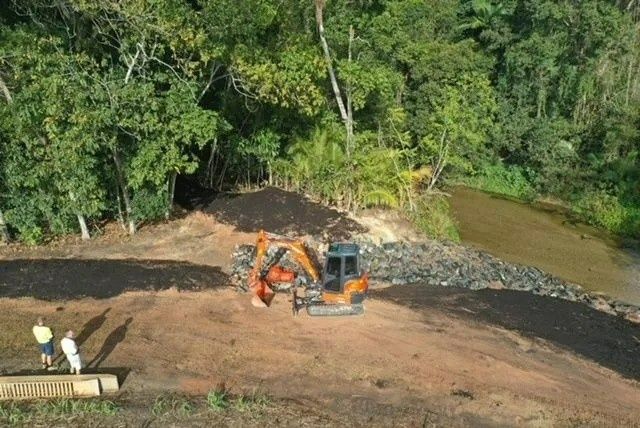 Excavator Works on Embankment Next to River — Macca's Dynamic Earthworks in Tolga, QLD