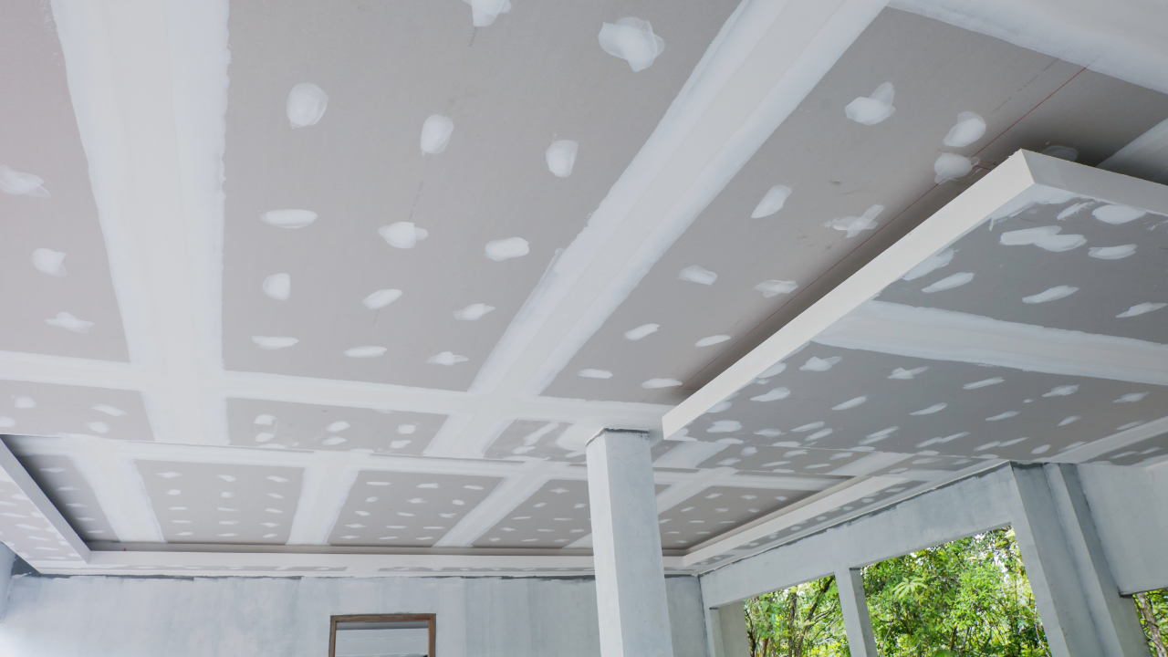 A room with a ceiling that is being remodeled.