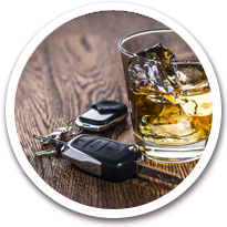 car keys next to an alcoholic drink
