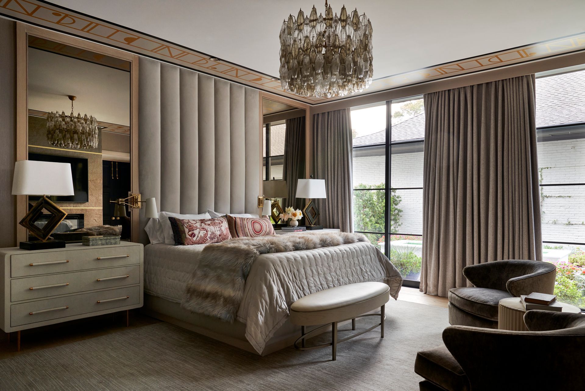 there is a large bed in the middle of the room .