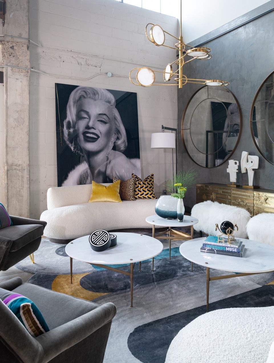 A living room with red walls and a purple couch