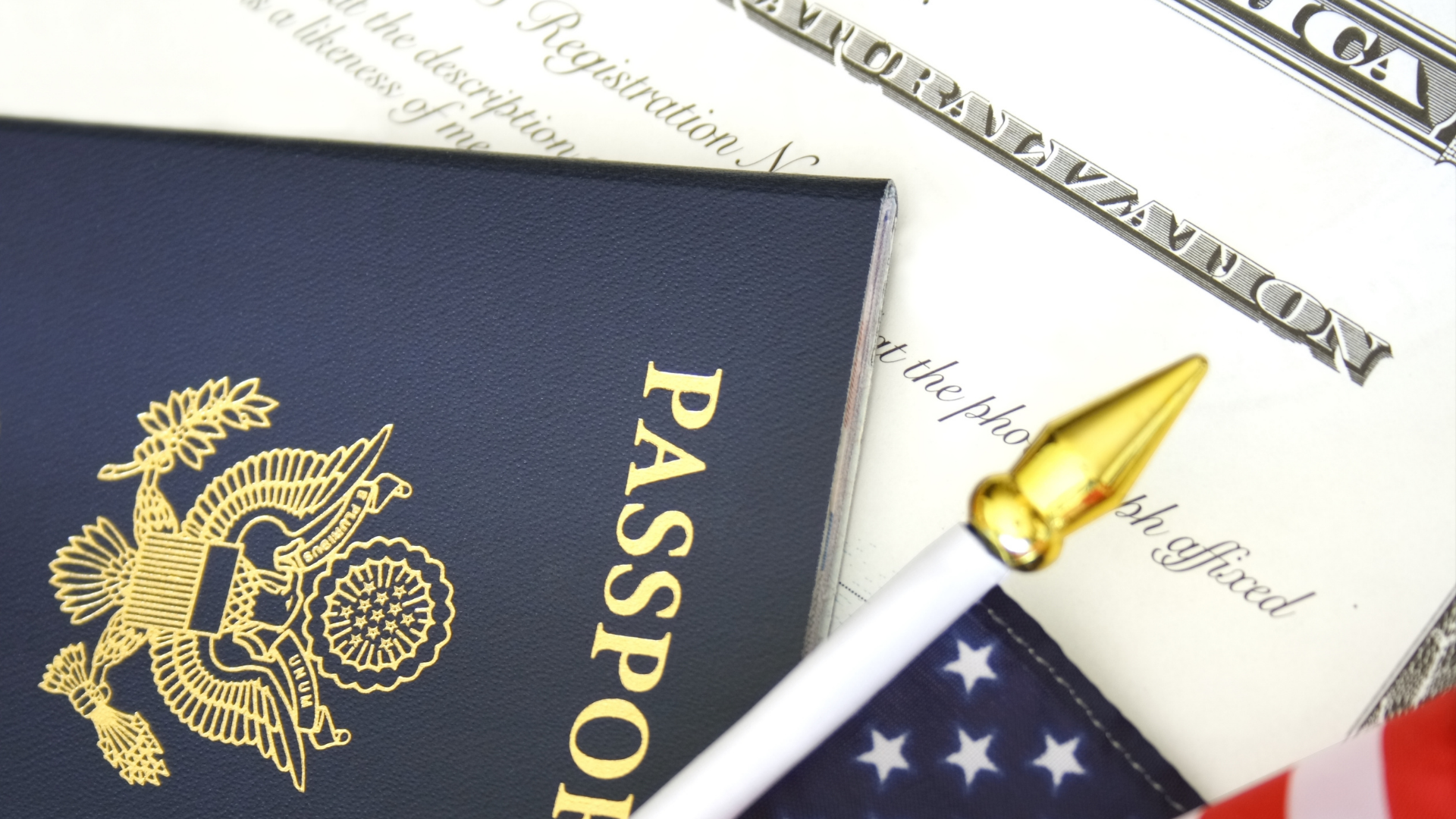 someone writing on a paper with a pen