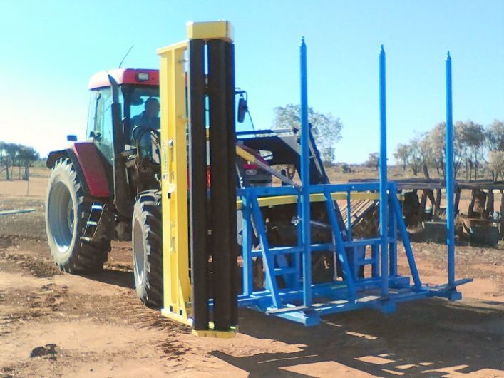 view of machine that is being used to install the fence