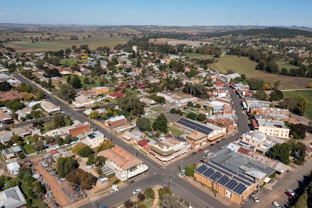 Aerial View of a Small Town With Lots of Buildings and Trees — KeyBay in Bowral, NSW