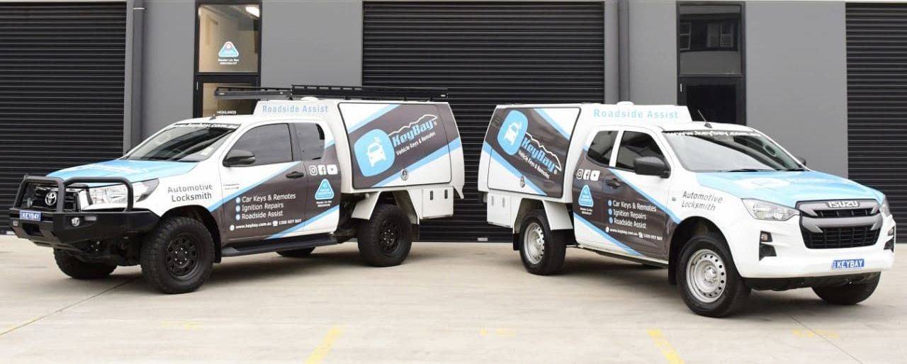 Two Trucks Are Parked in Front of a Building — KeyBay in Mittagong, NSW