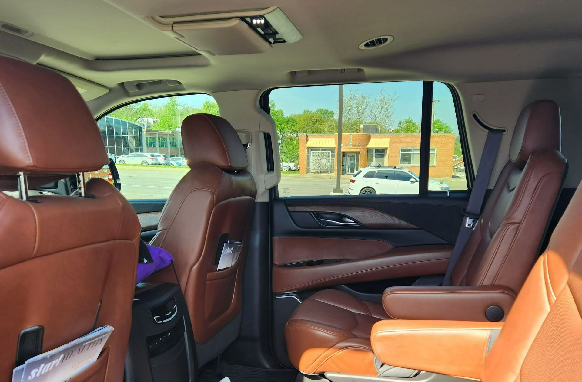 Concierges Black 2017 Escalade SUV interior side view