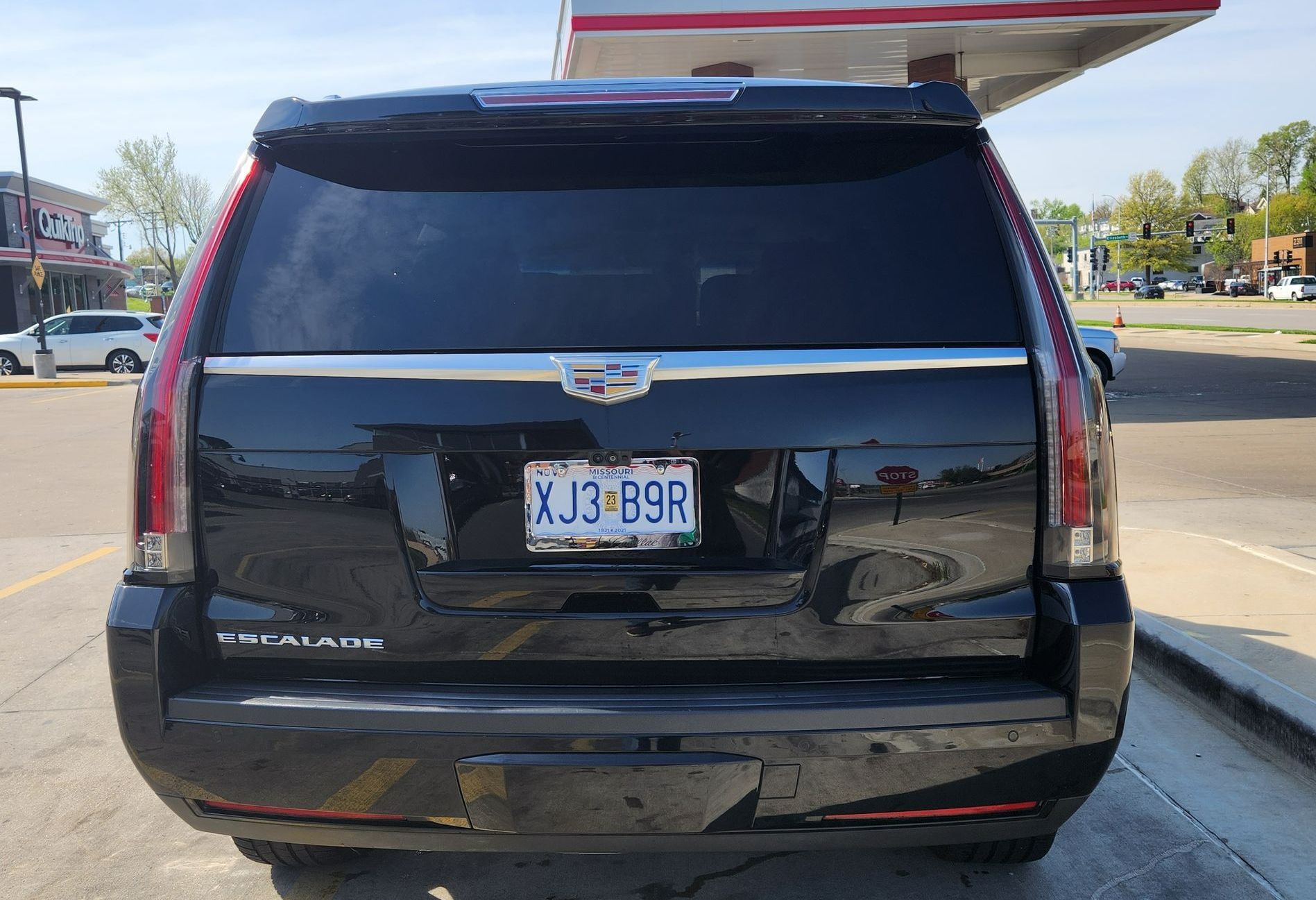 Concierges Black 2017 Escalade SUV exterior back view