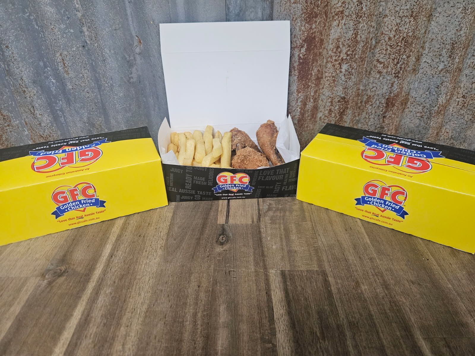 A Refrigerated Display Case Stocked With Packaged Food Items — Bluewater Diner in Bluewater, QLD