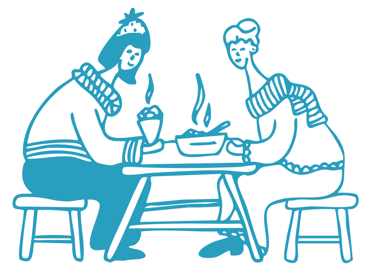 Two people seated at a table, enjoying a hot meal and drinks on a cold day.