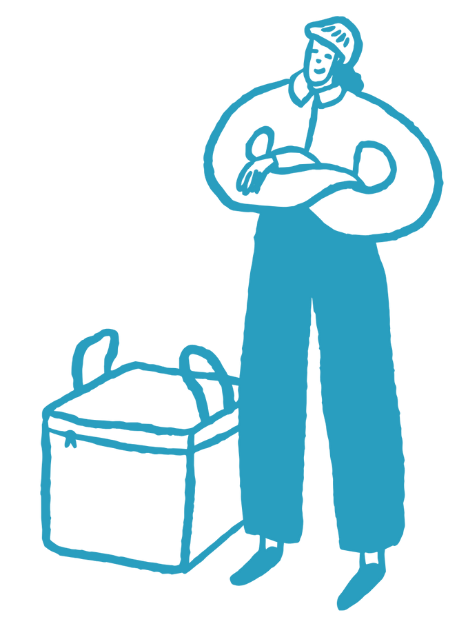 Person standing beside a large, square container, arms crossed, looking up with a thoughtful expression.