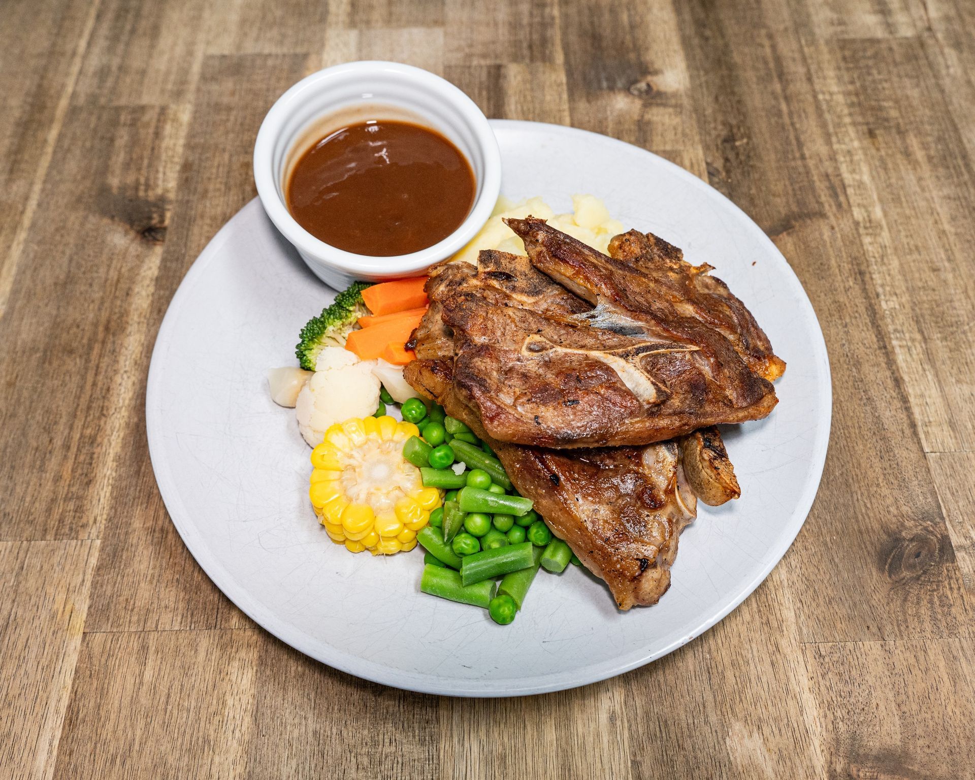Food Truck in a Field, Menu Board Visible. Mountains in the Background — Bluewater Diner in Bluewater, QLD