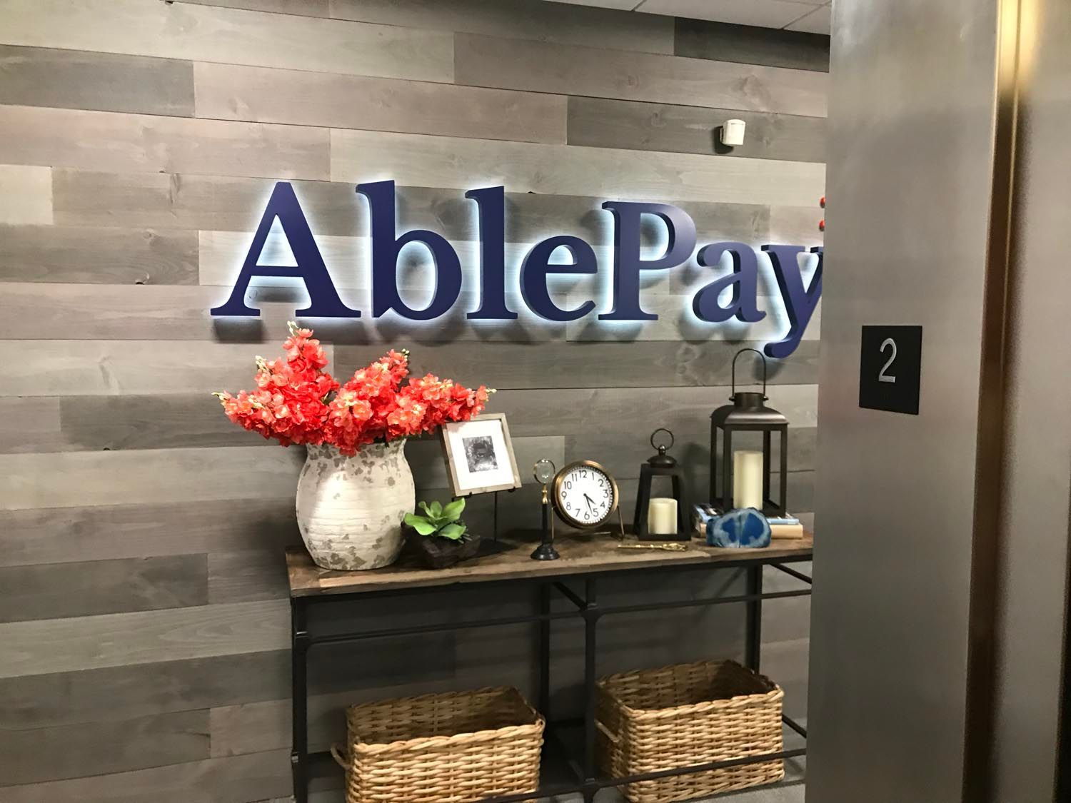 There is a sign on the wall that says ablepay.