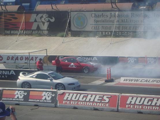 Land Vehicle — Red And White Sedan Sports Car in La Puente, CA