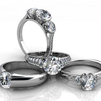 Three rings are stacked on top of each other on a white surface