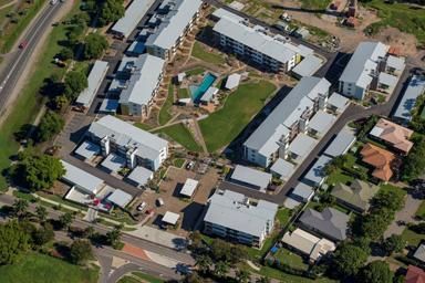 An Aerial View Of A Residential Area With Lots Of Buildings — Mascrete Pty Ltd In Hermit Park, QLD