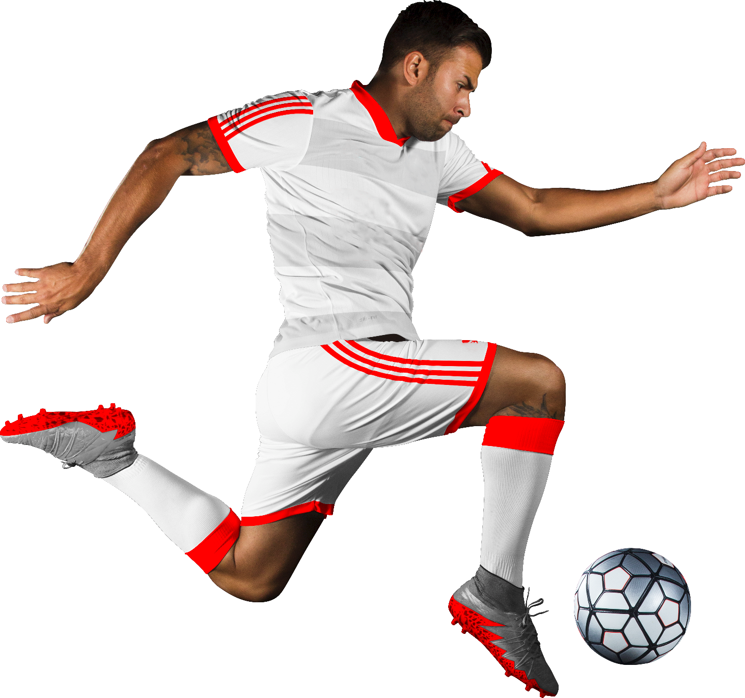 Soccer player in white uniform kicking ball.