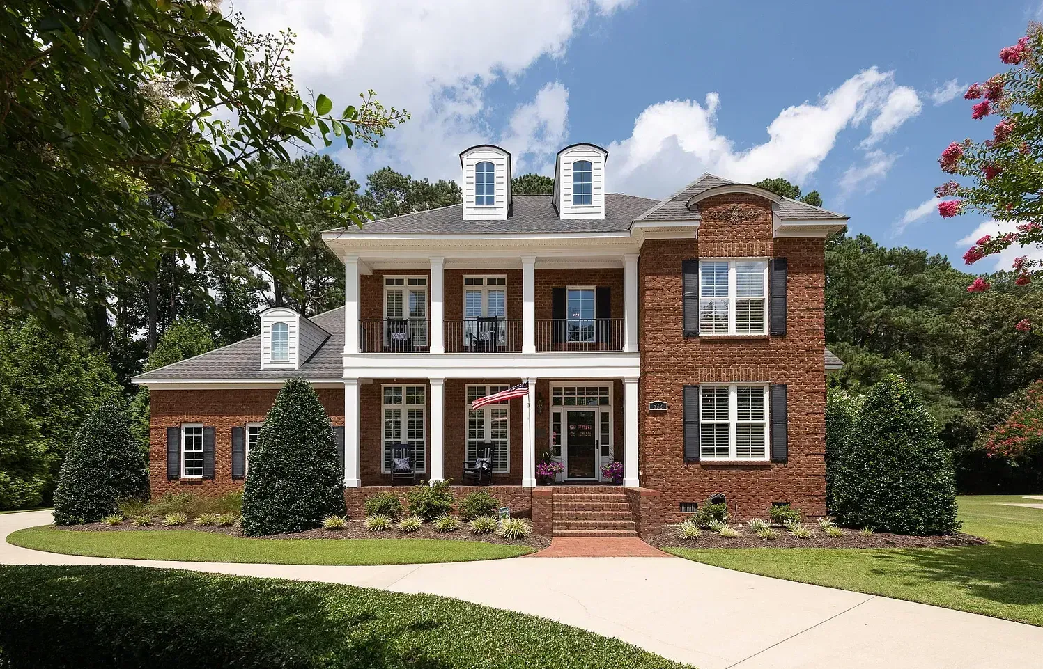 House with a big grassy front yard