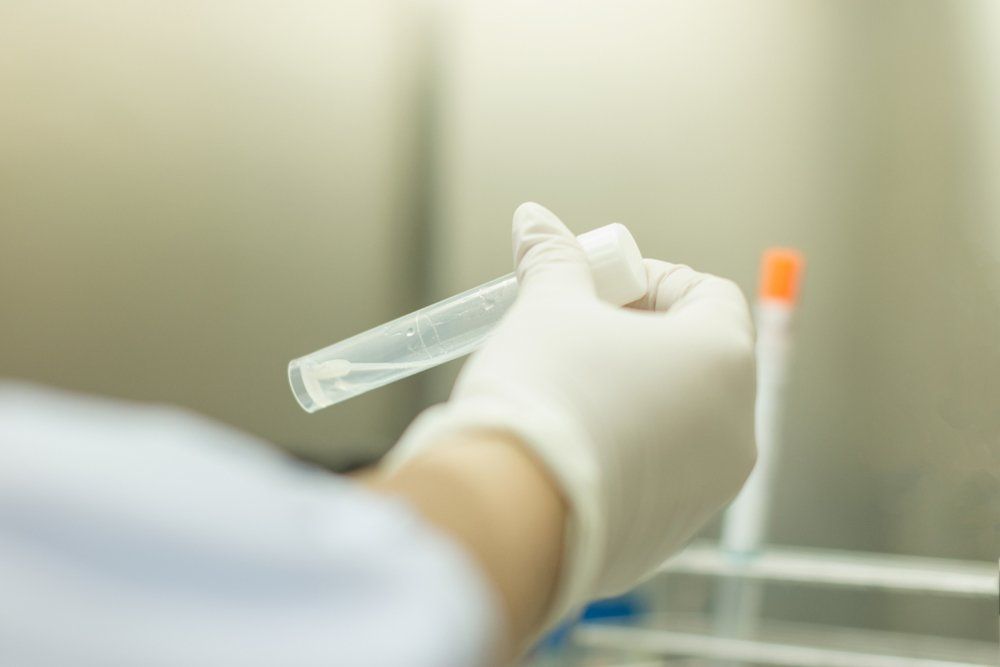 Doctor Examining Urine — North Port, FL — A-1 Fingerprinting and Drug Screening