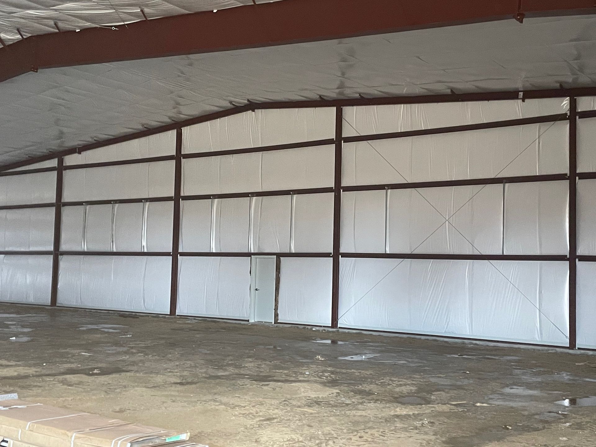 The inside of a large building with white walls