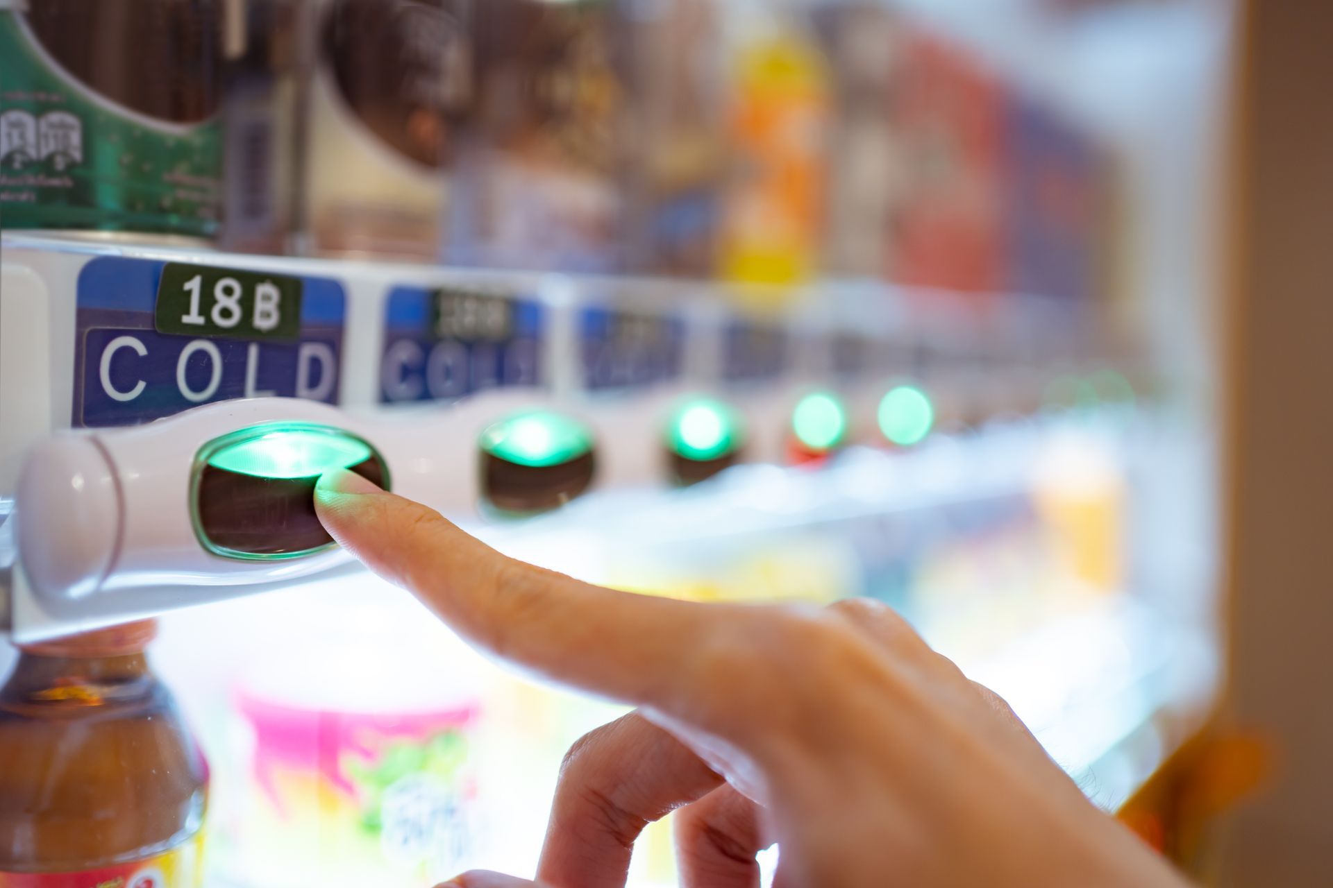 Full-service vending machine supplier with illuminated beverage buttons and snack display. Full-service vending machine supplier with illuminated beverage buttons and snack display.