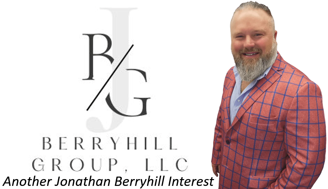 A man in a suit is standing in front of a berryhill group logo.