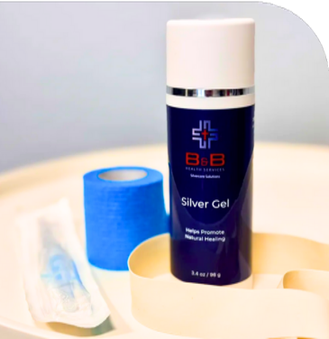 A doctor is talking to an elderly woman in a wheelchair.