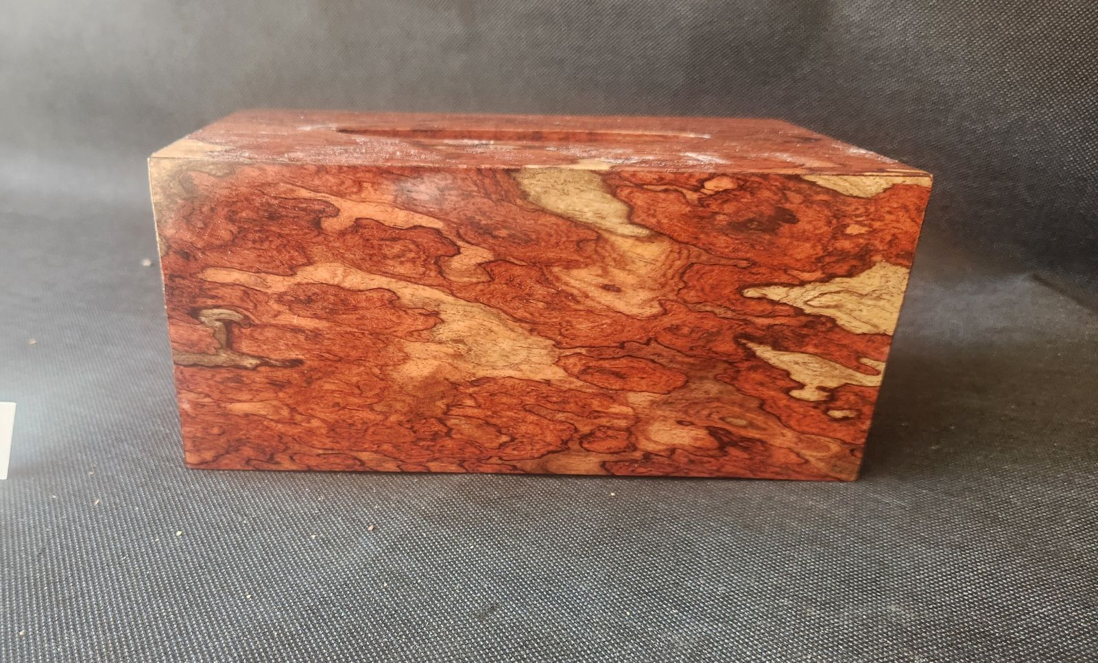 Rosewood tissue box with smooth, mottled finish