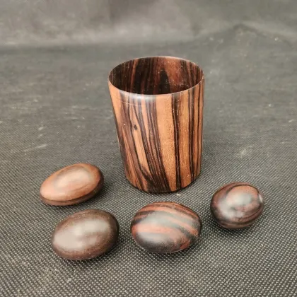 Macassar Ebony Round Holder
with 4 eggs 
$85