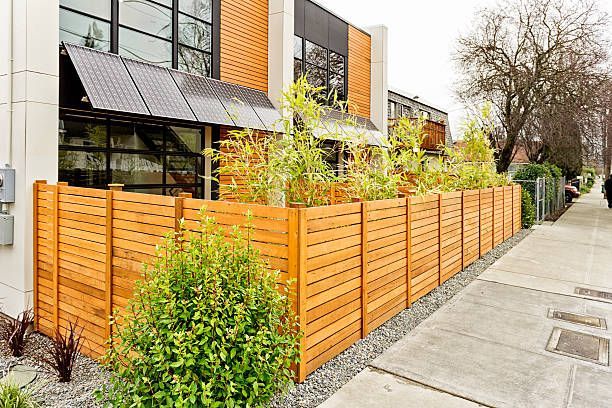 Living green with wood fences installed