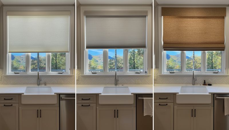 Three kitchen windows with different shades above a sink and counter.