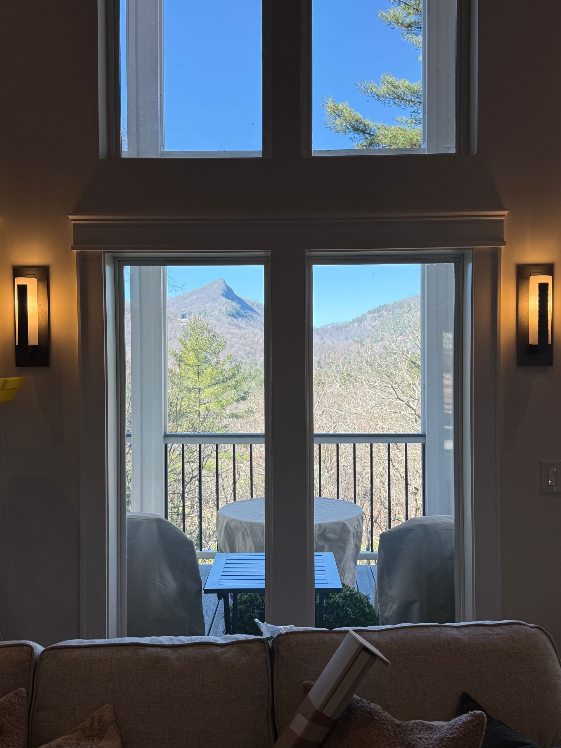 Before: uncovered casement windows and French doors in vaulted great room — Sapphire NC