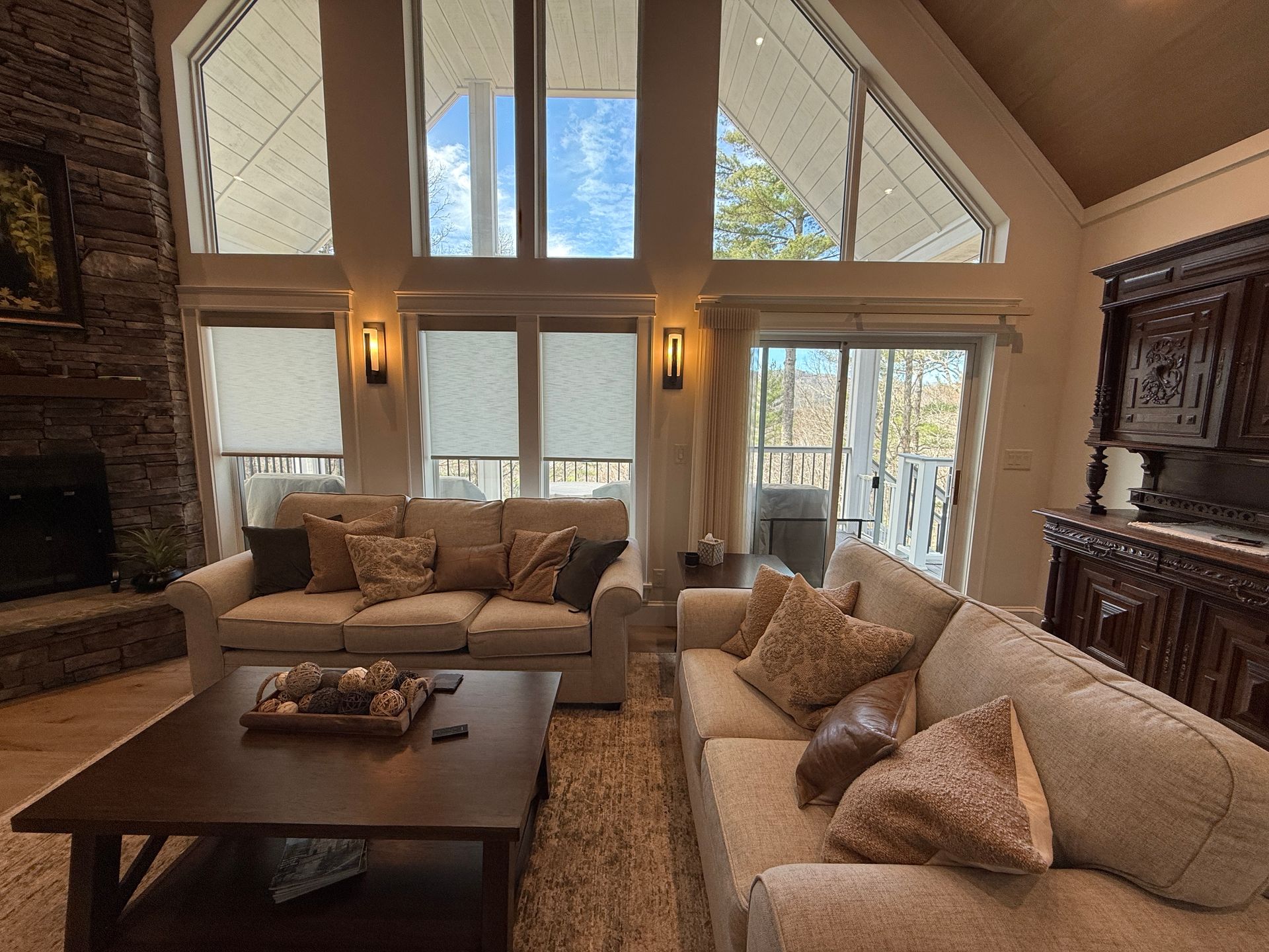 Norman® SmartDrapes® with roller shades in vaulted great room — Sapphire NC by Love is Blinds NC