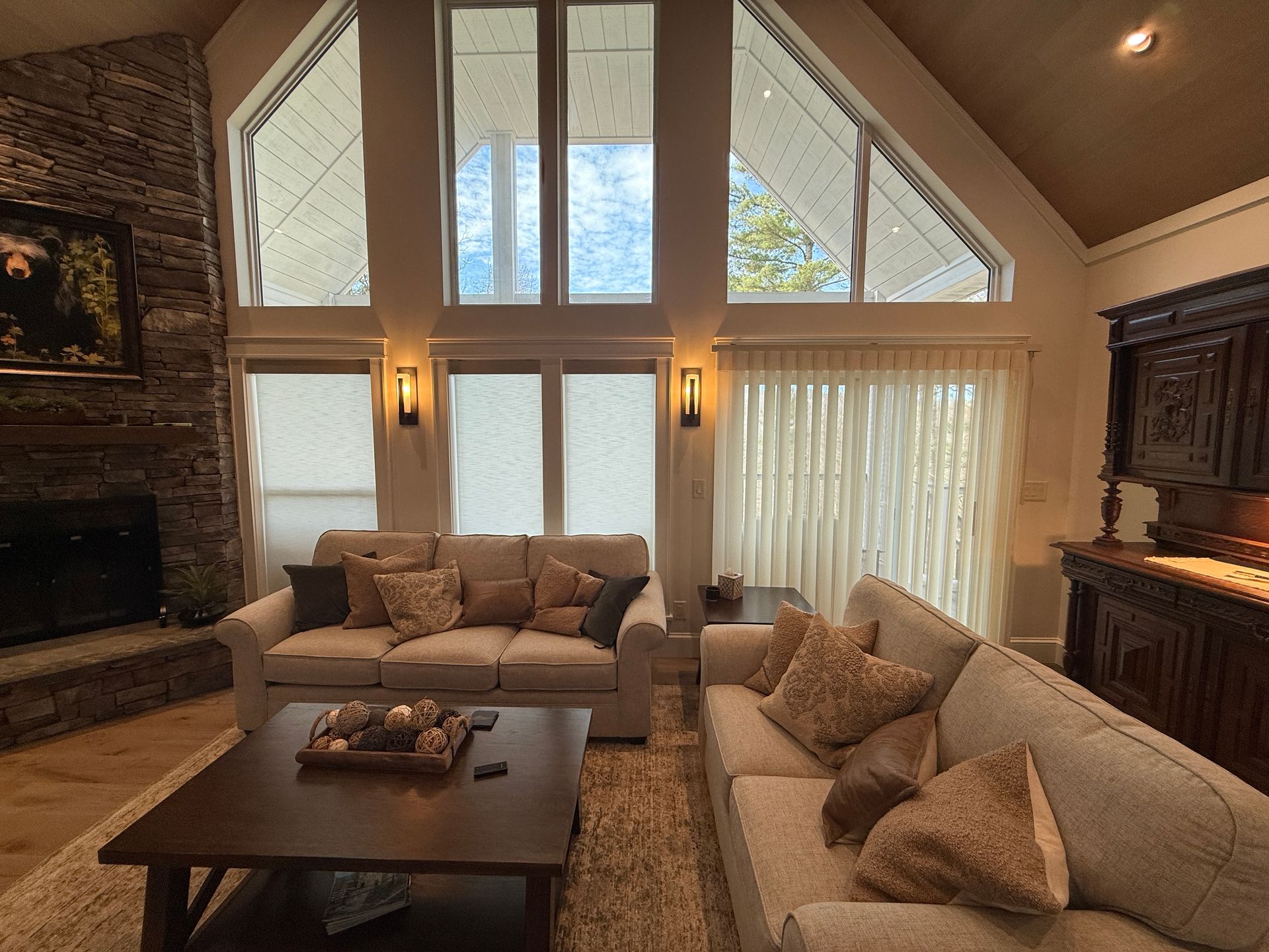 Norman® SmartDrapes® and roller shades installed together in vaulted great room — Sapphire NC mountain home by Love is Blinds NC