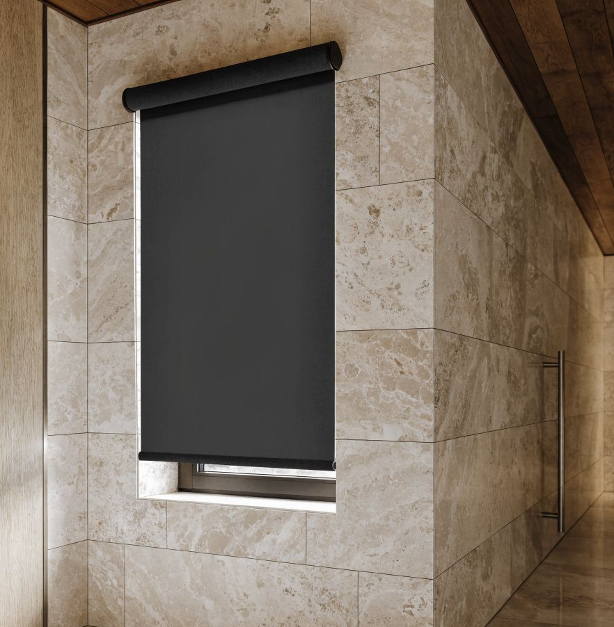 Modern stone hallway with a small window covered by a dark roller blind
