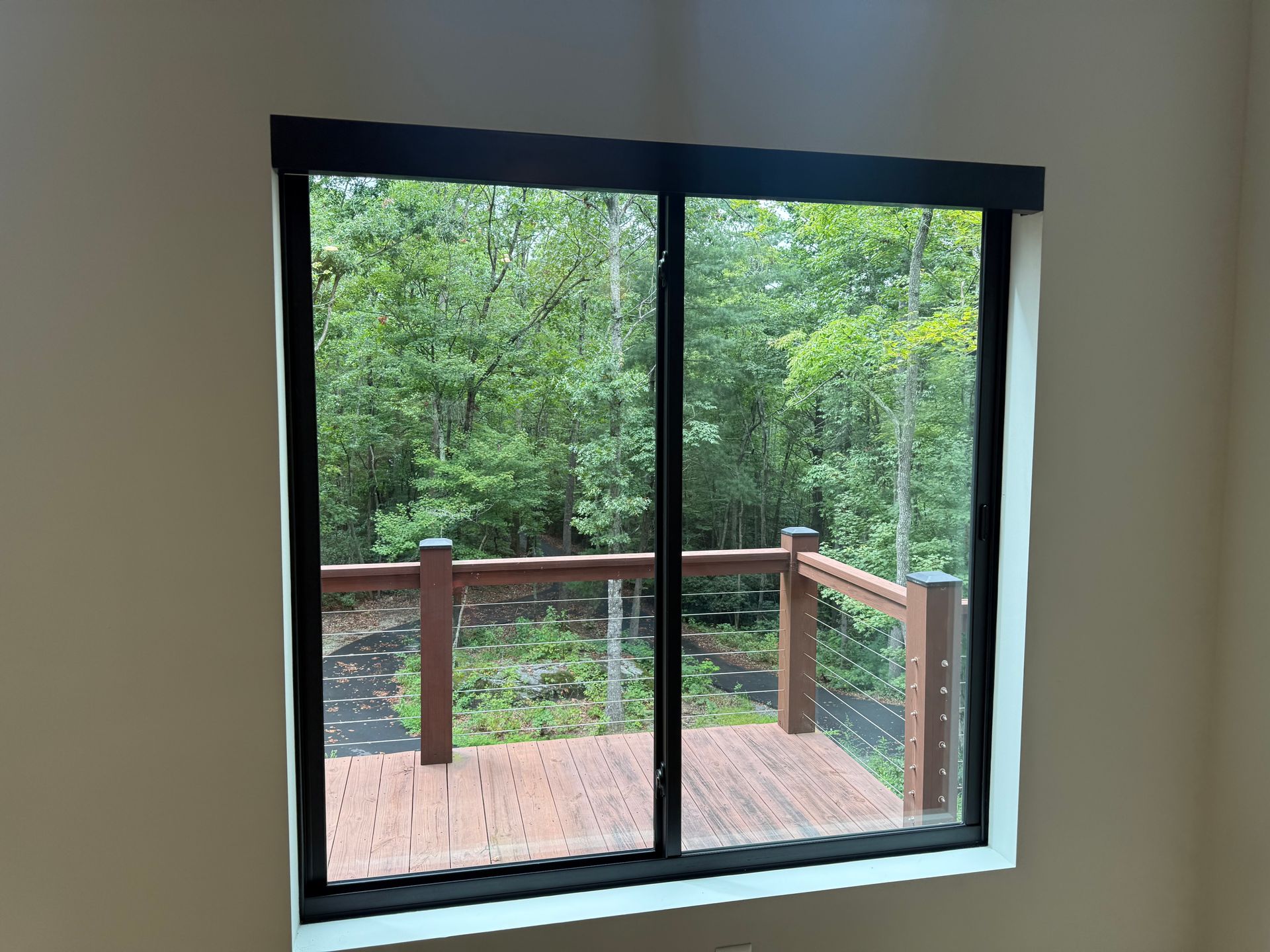 Before Alta TouchLift roller shades – light‑filtering screen, Linen Fog – living room, Fairview NC
