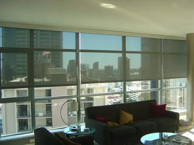 A living room with a couch and a view of the city Love is Blinds North Carolina