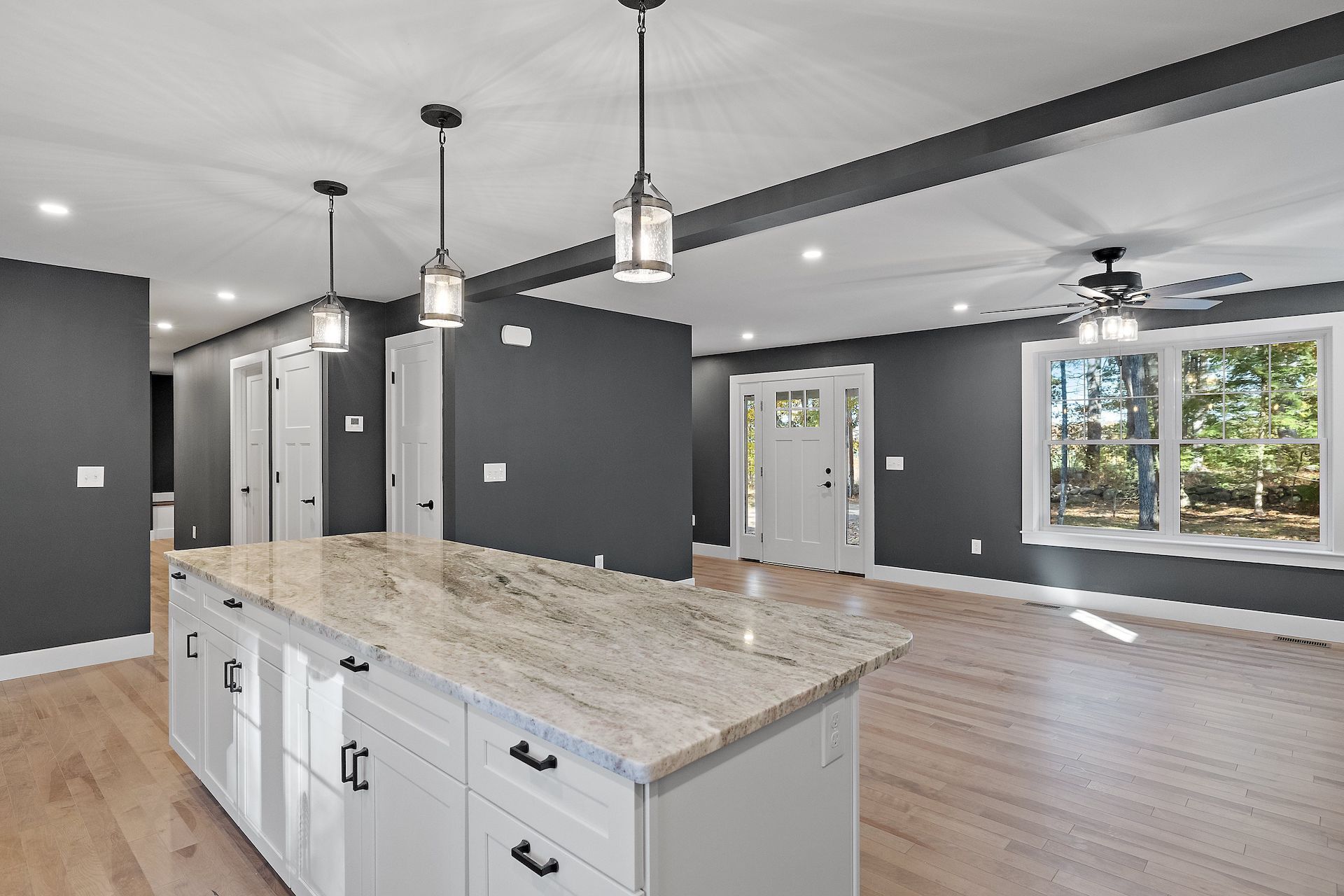 There is a large island in the middle of the kitchen.