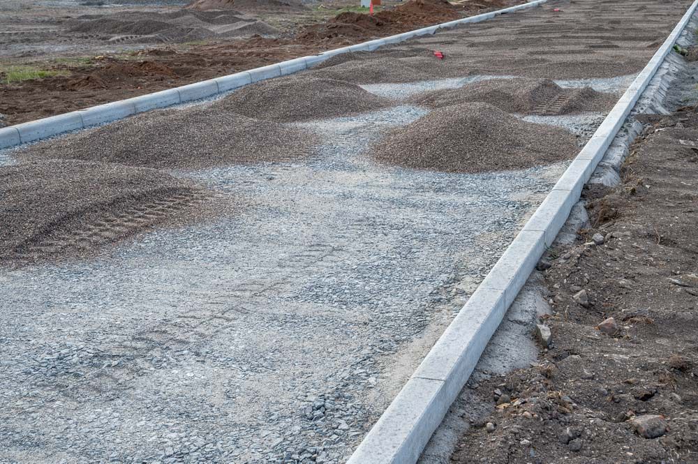 Concrete Road Under Construction — Ian Brown Sand Supplies and Tipper Hire In Laurieton, NSW