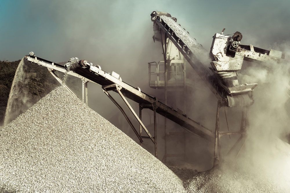 Conveyor Belt Carrying Gravel — Ian Brown Sand Supplies and Tipper Hire In Port Macquarie, NSW