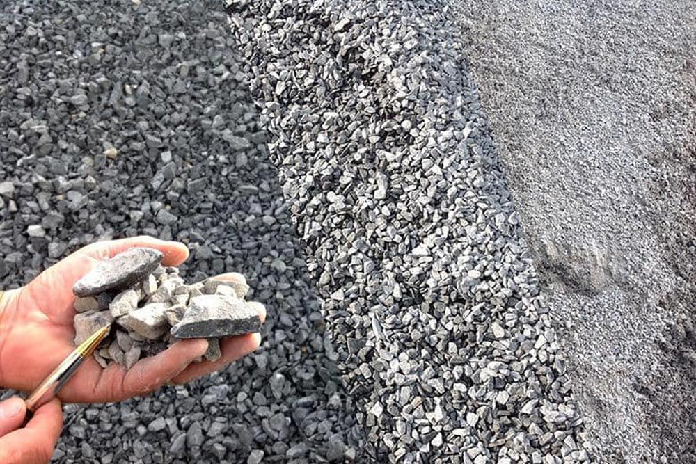 Holding A Pen And Aggregates