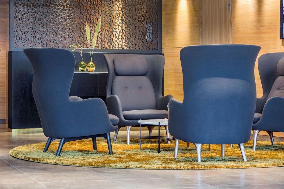 A group of chairs and a table in a room
