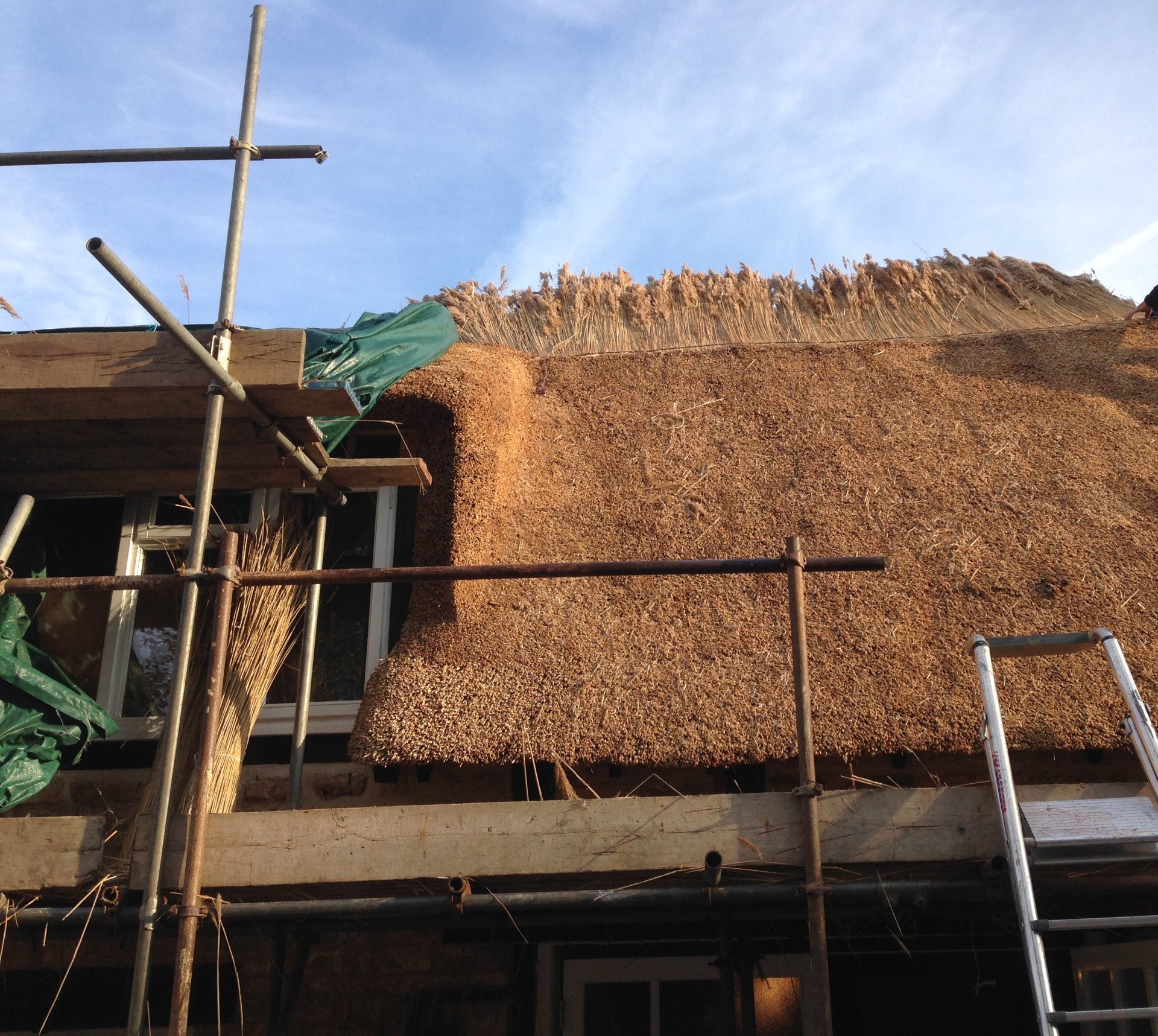 Thatched roof repair by RTB construction in Cheltenham
