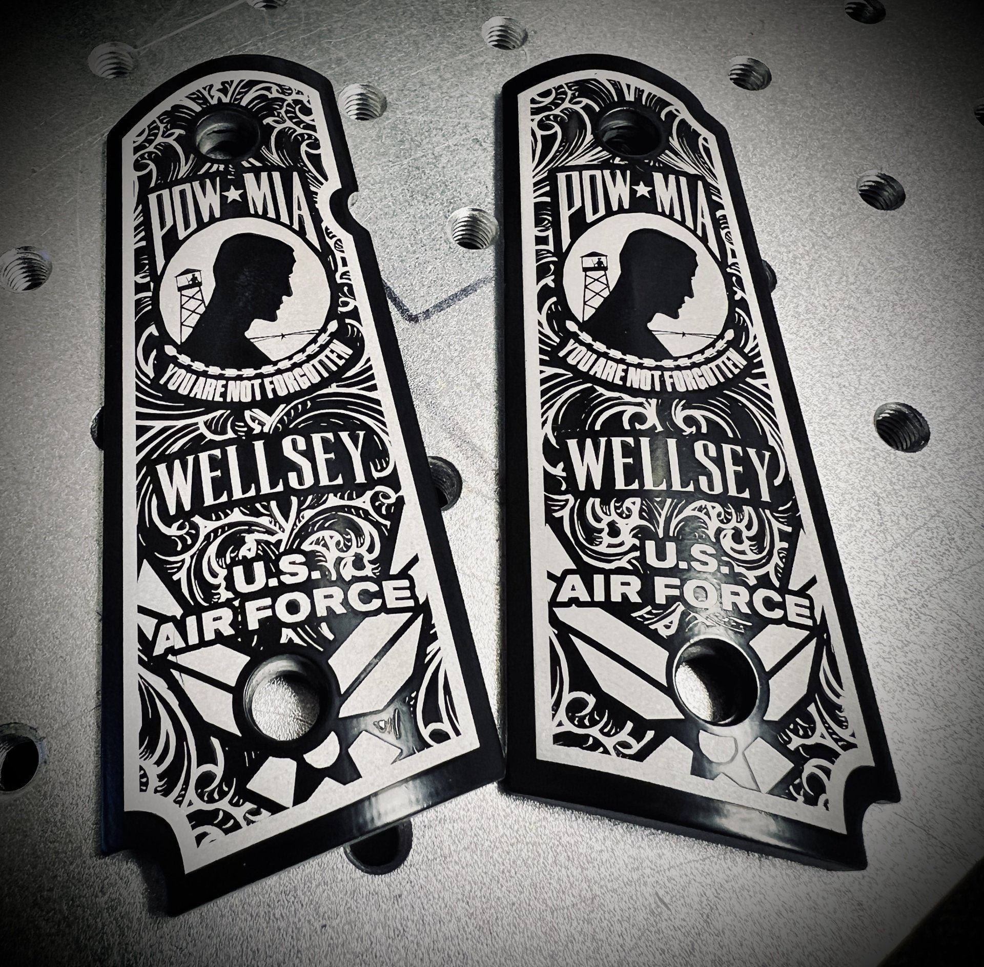 A pair of wellsey u.s. air force pistol grips